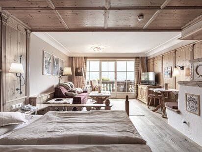 Kategorie Landhaus Zimmer Komfort  Wohnraum und Bett | Der Engel in Tirol