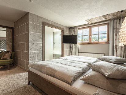 Kategorie Pure Tirol Zimmer Suite Himmlisch mit Kinderzimmer Bett | Der Engel in Tirol